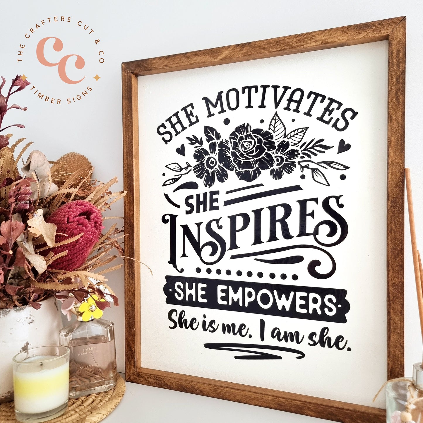 She inspires timber sign.