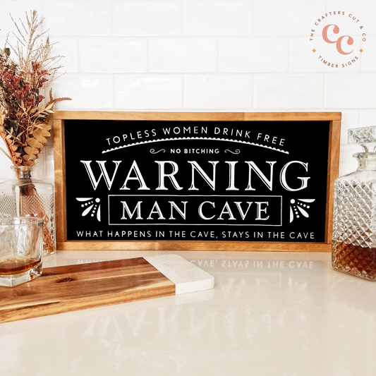 Warning man cave - topless women